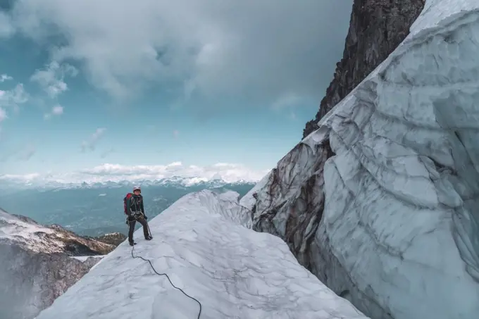 Climber on Tantalus Traverse, a classic alpine traverse close to Squamish, British Columbia, Canada