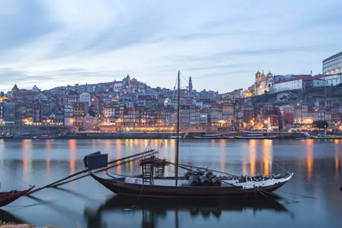 Portugal, Porto, Traditional rabelo boats on Douro river at dusk