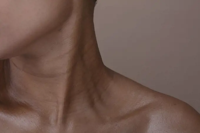 Close-up of woman's neck