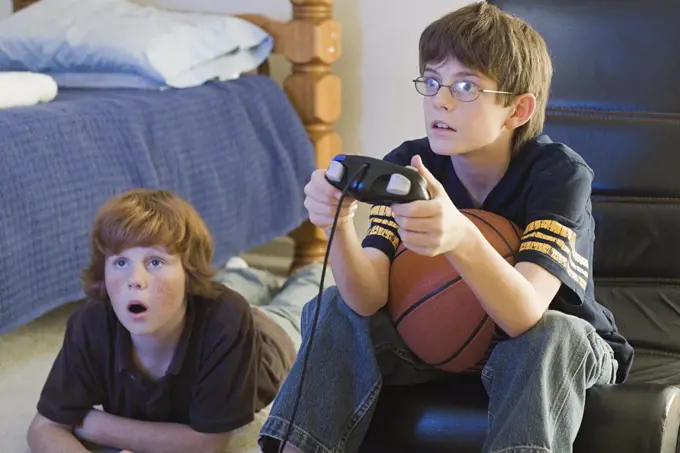 Two boys playing a computer game