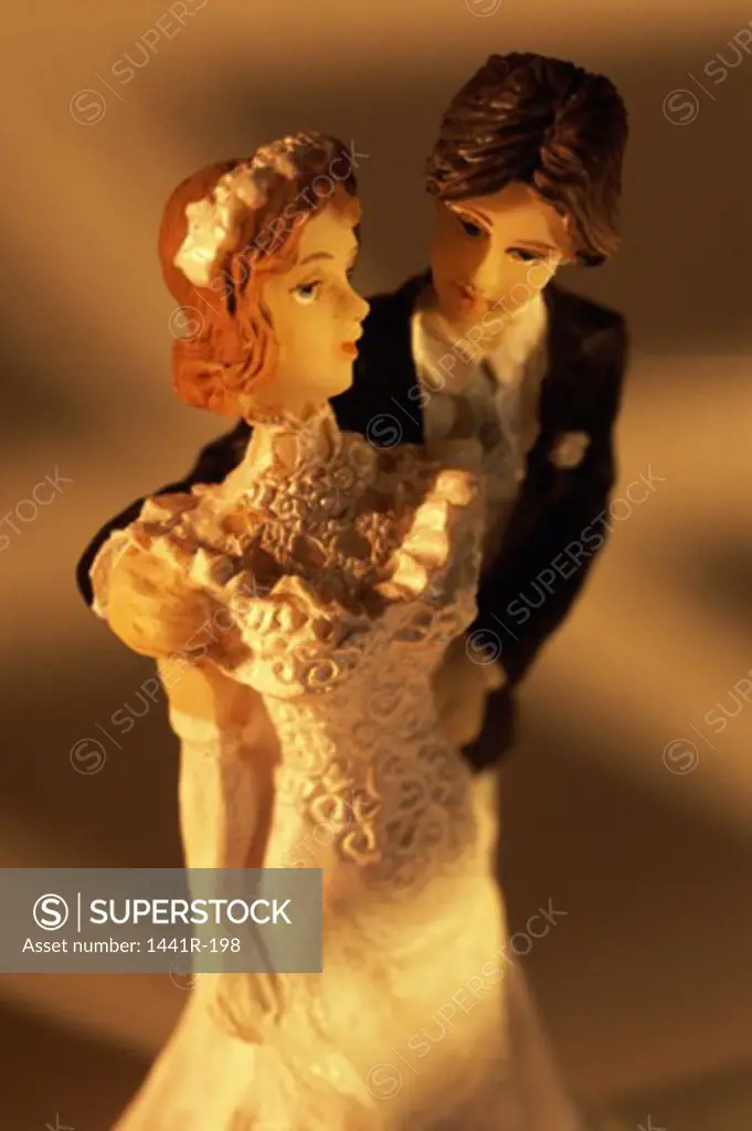Close-up of a bride and groom figurine