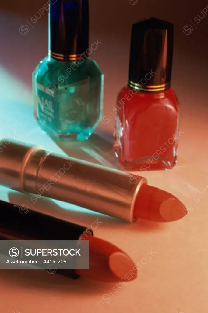 Close-up of lipsticks and nail polish