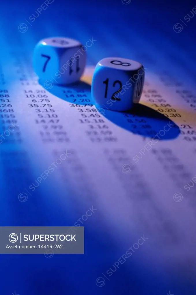 Pair of numbered dice on stock listings