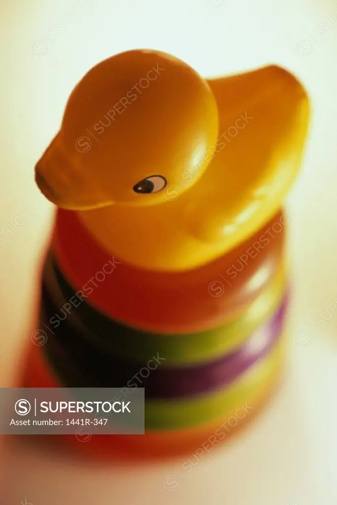 Close-up of a rubber duck on rings