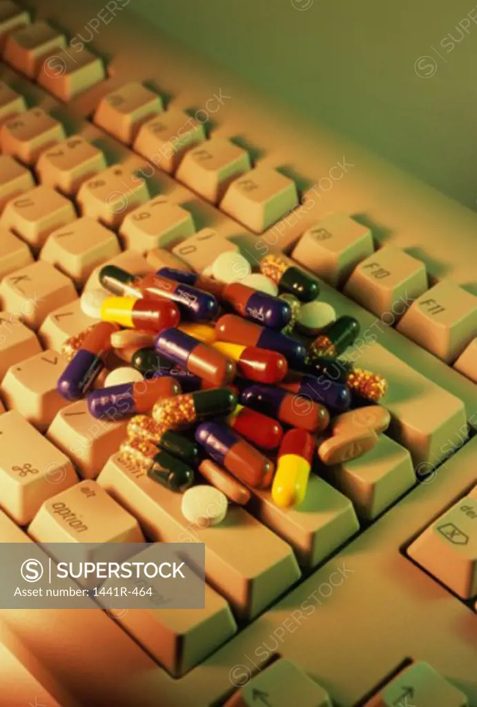 Medical capsules on a computer keyboard