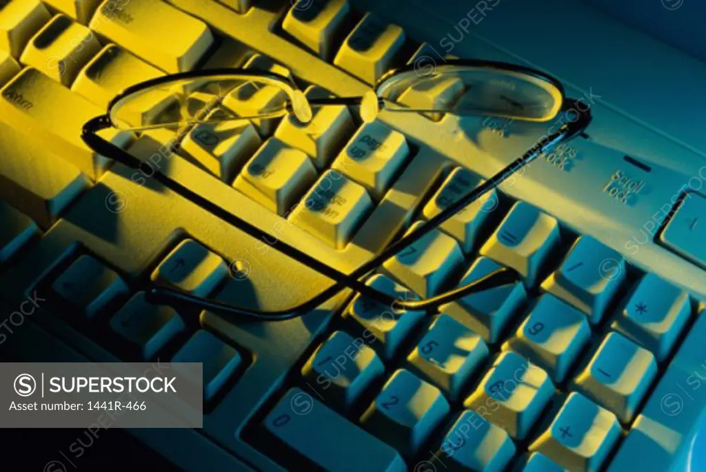 High angle view of eyeglasses on a computer keyboard