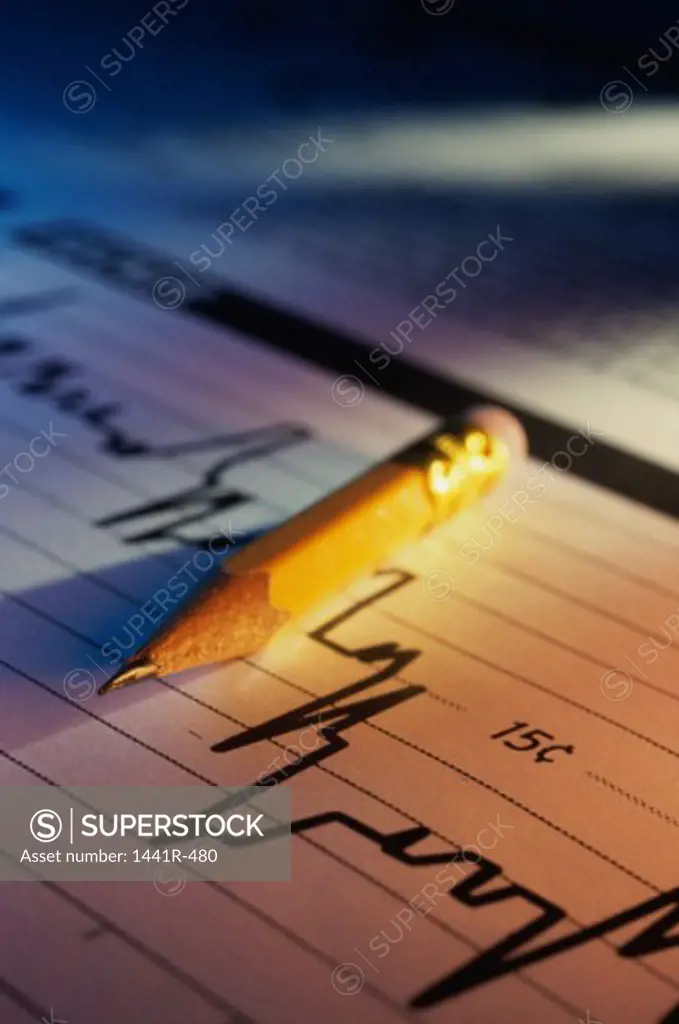 Pencil lying on a paper graph