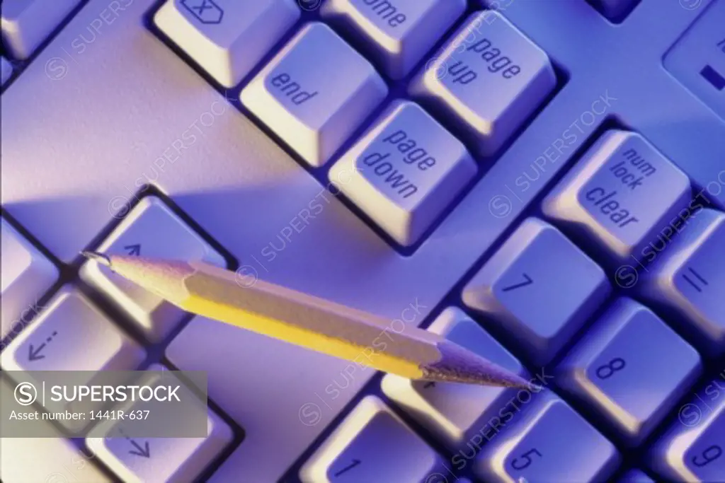 High angle view of a pencil on a computer keyboard