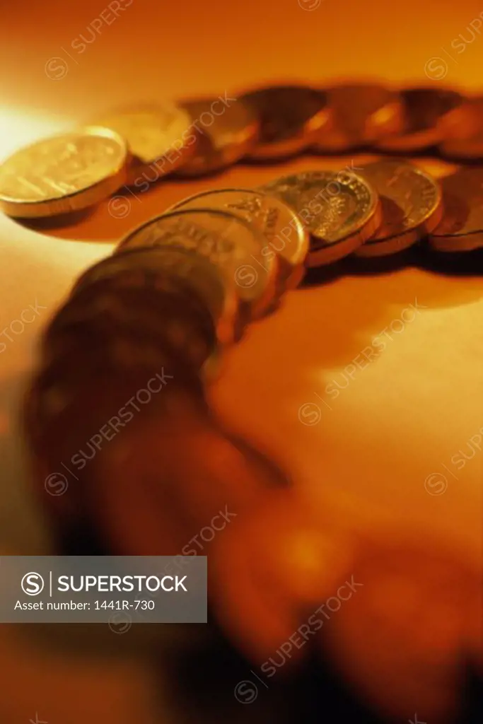 Close-up of a circular arrangement of coins
