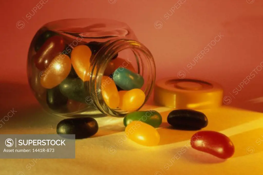 Jellybeans spilling from a jar