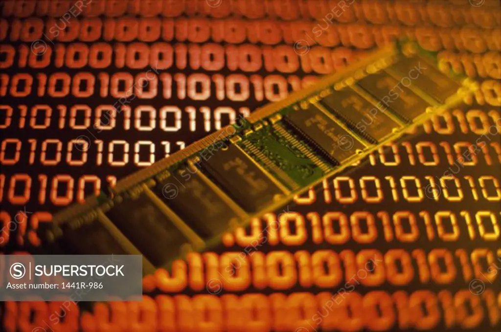 Close-up of a computer RAM chip on binary code