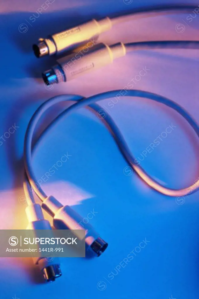 Close-up of two computer cables