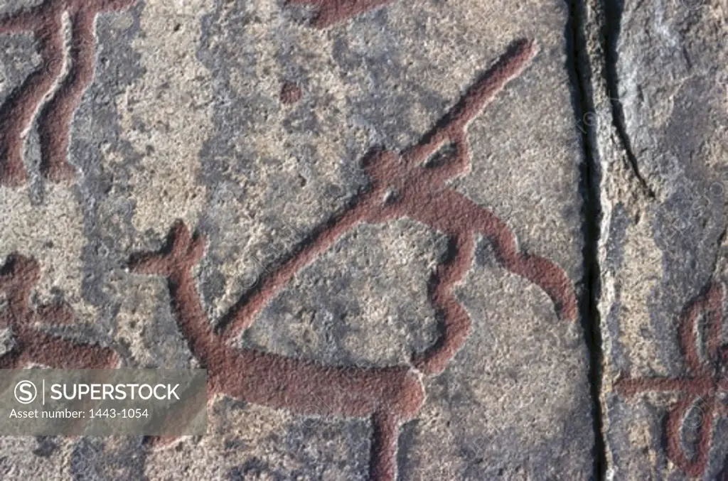 Hunting Scene from the Bronze Age Prehistoric Art Rock drawings Tanum, Sweden