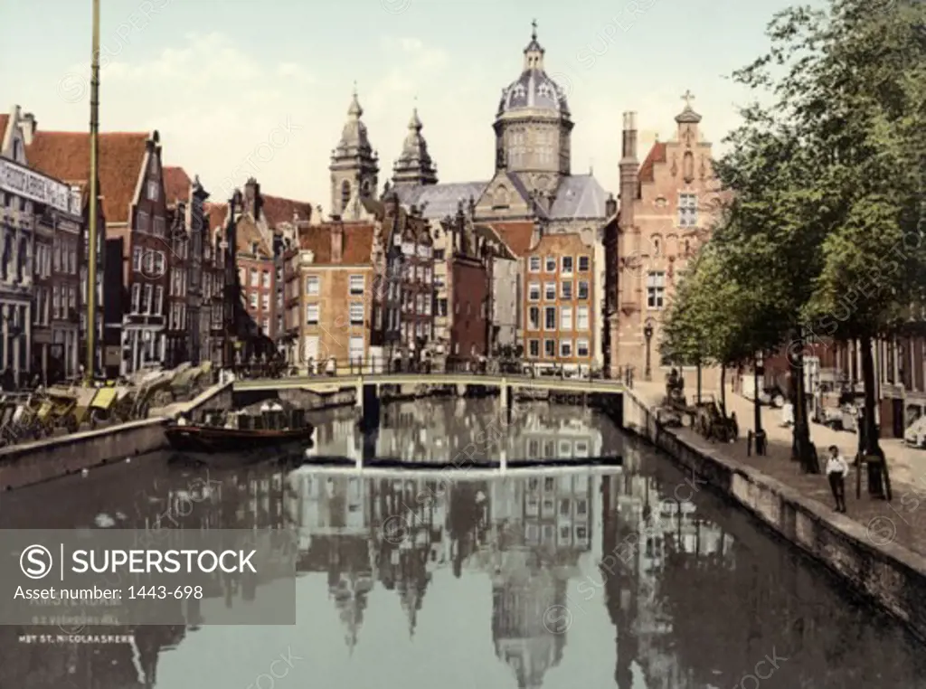 Reflection of buildings in water, Oudezijds Voorburgwal, Amsterdam, Netherlands