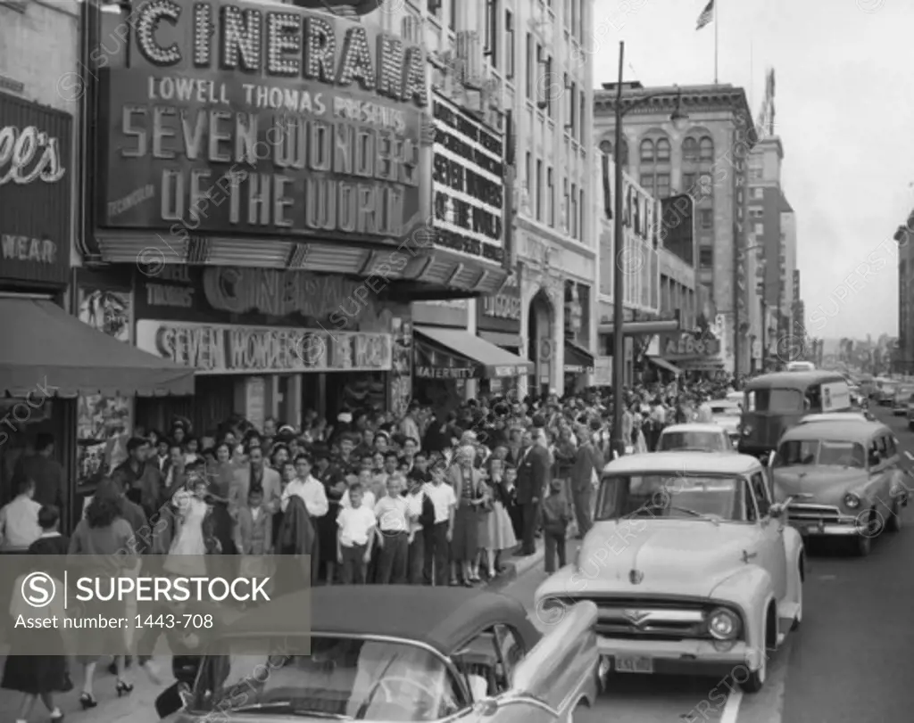 Crowd in front of a movie theater, Cinerama, Hollywood, Los Angeles, California, USA, c. 1956