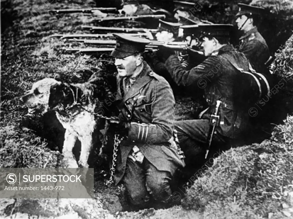 Group of men pointing rifles, English Infantry, World War I