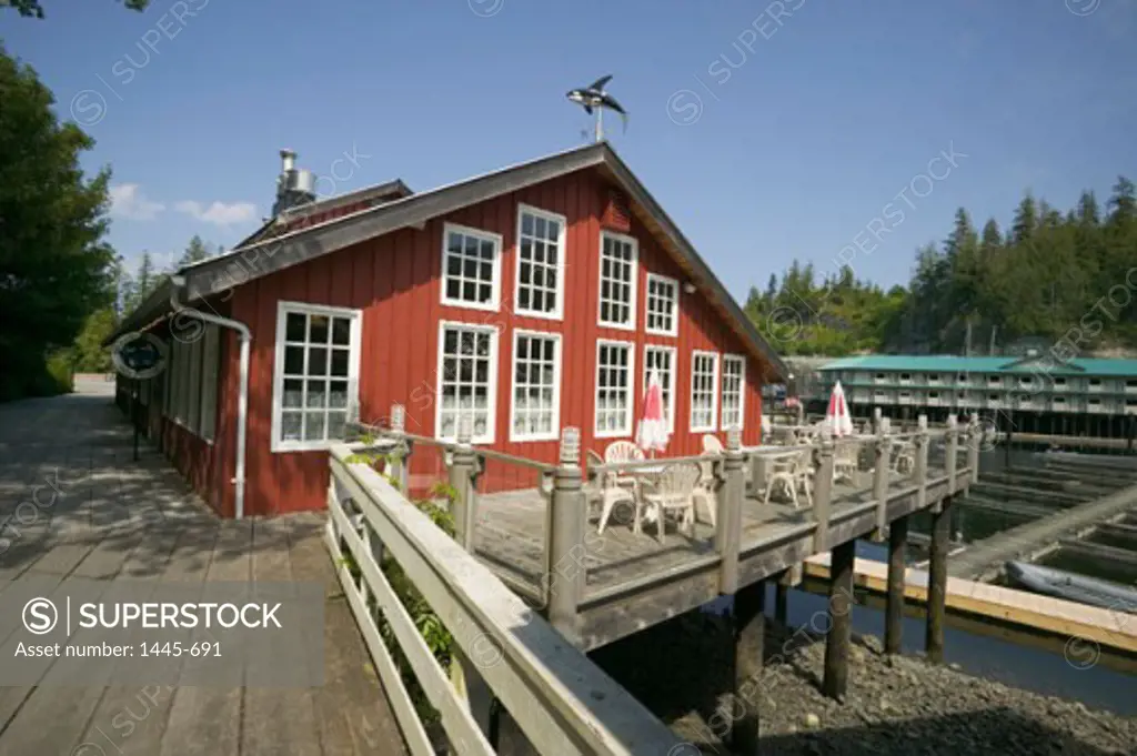 Chairs in front of a cafe, Telegraph Cove, British Columbia, Canada