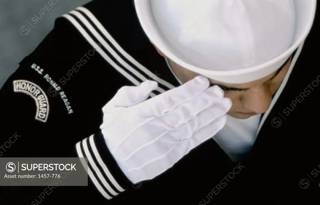 High angle view of a soldier saluting during a burial at sea ceremony