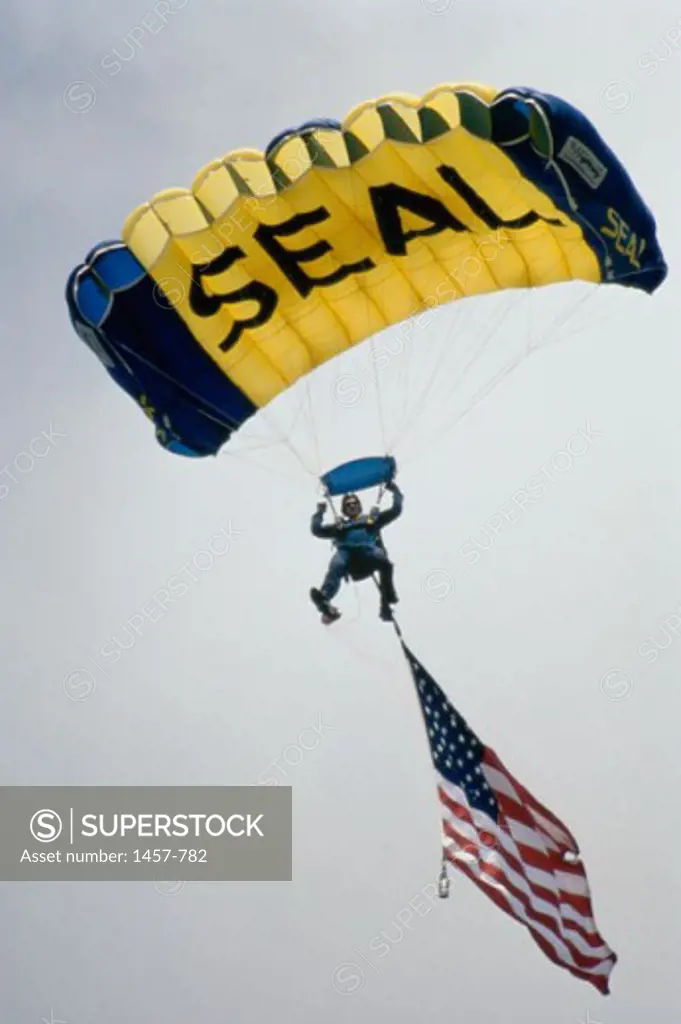 Low angle view of a man parachuting
