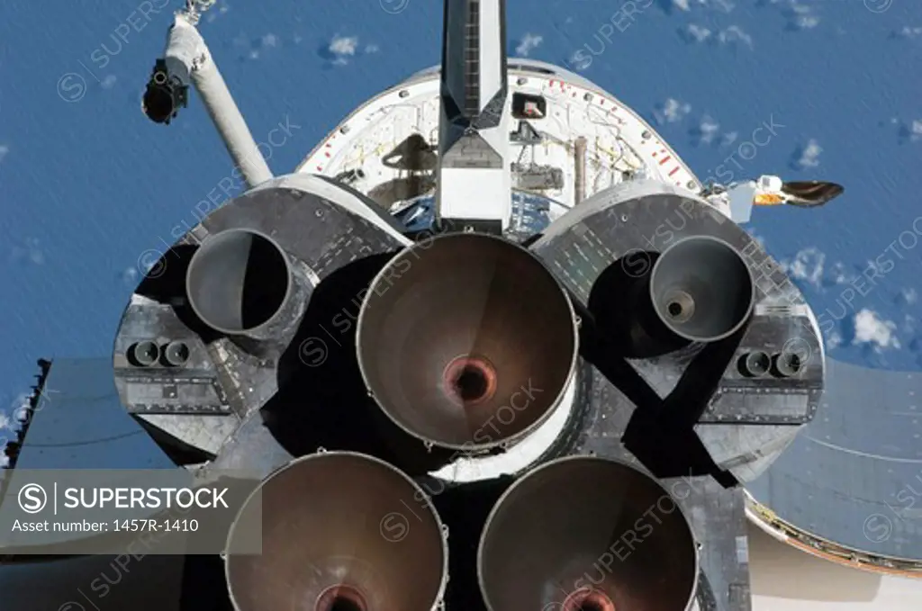 View of the three main engines of Space Shuttle Endeavour's aft section.