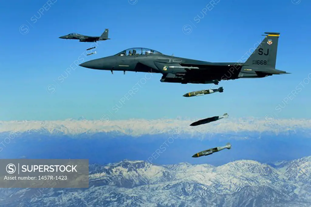 U.S. Air Force F-15E Strike Eagle aircraft drops 2,000-pound joint direct attack munitions.