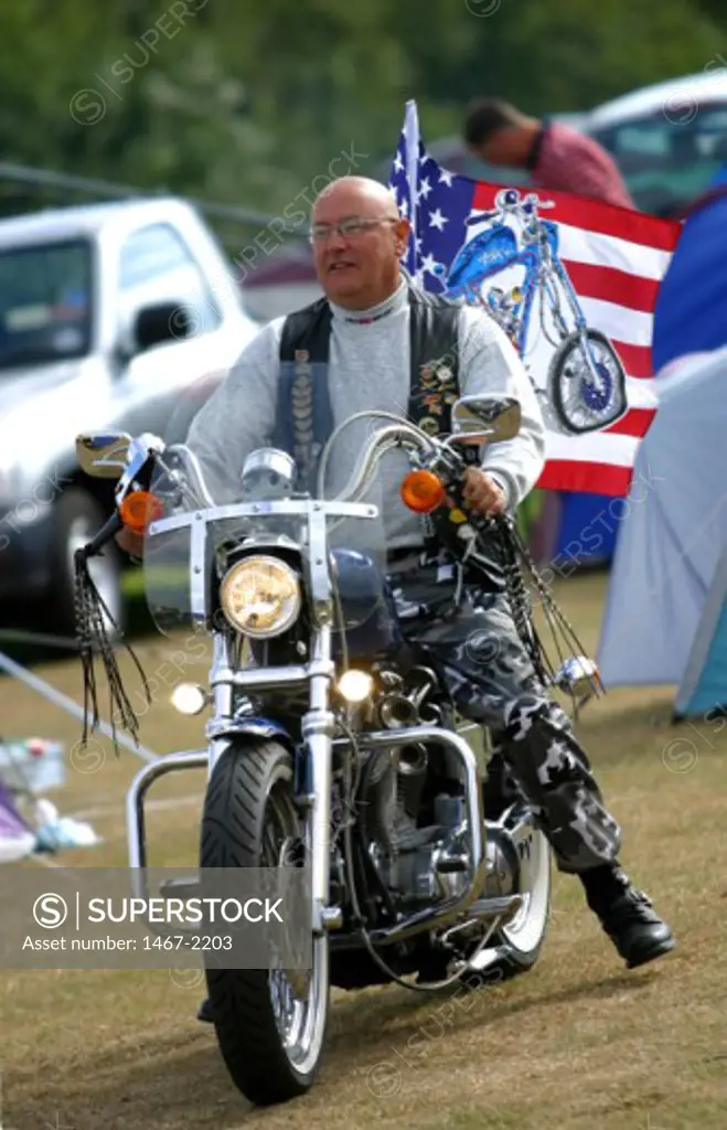 Mature man riding a motorcycle