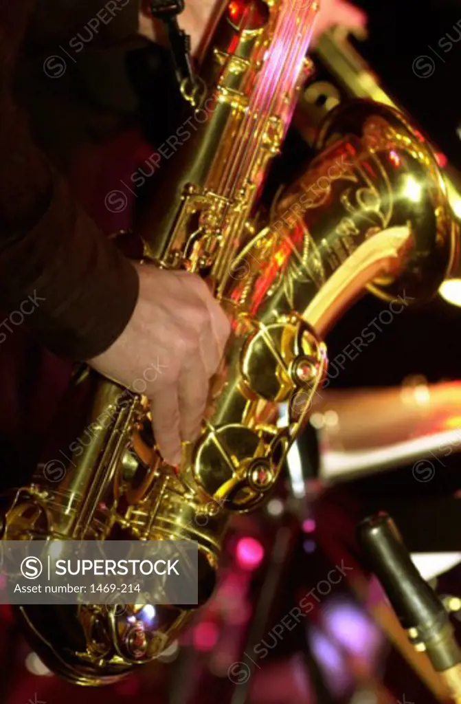 Close-up of a saxophonist playing a saxophone