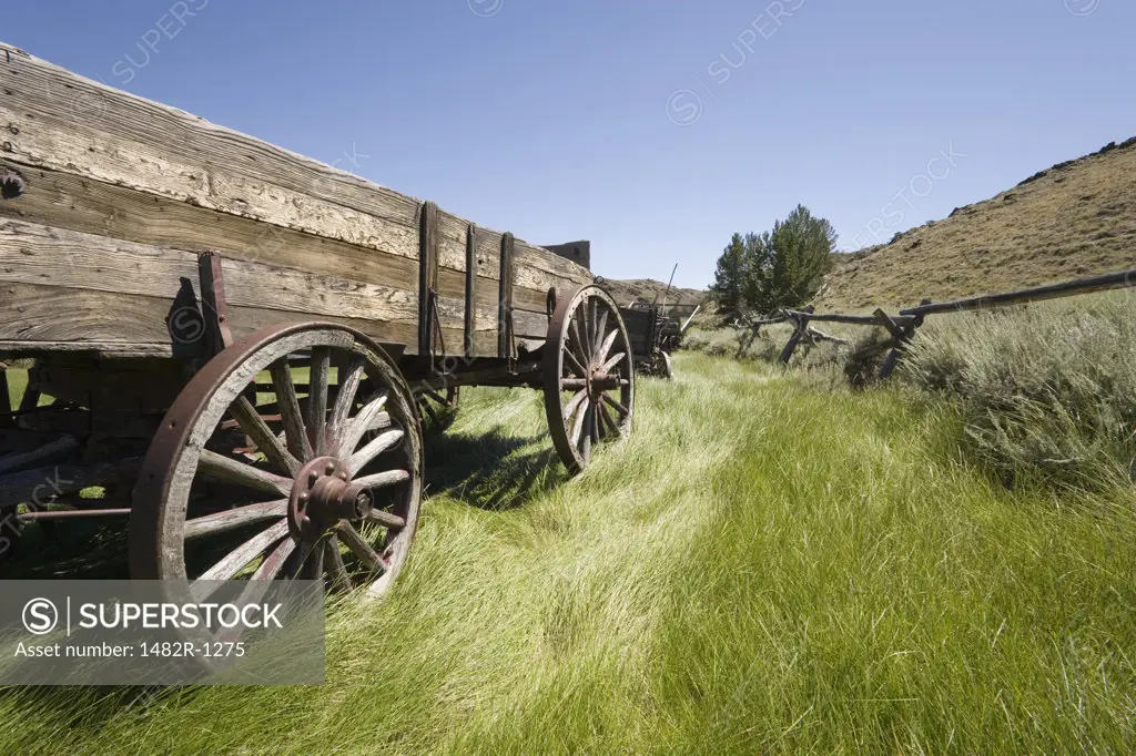 Old horse cart in a field, South Pass City, Wyoming, USA