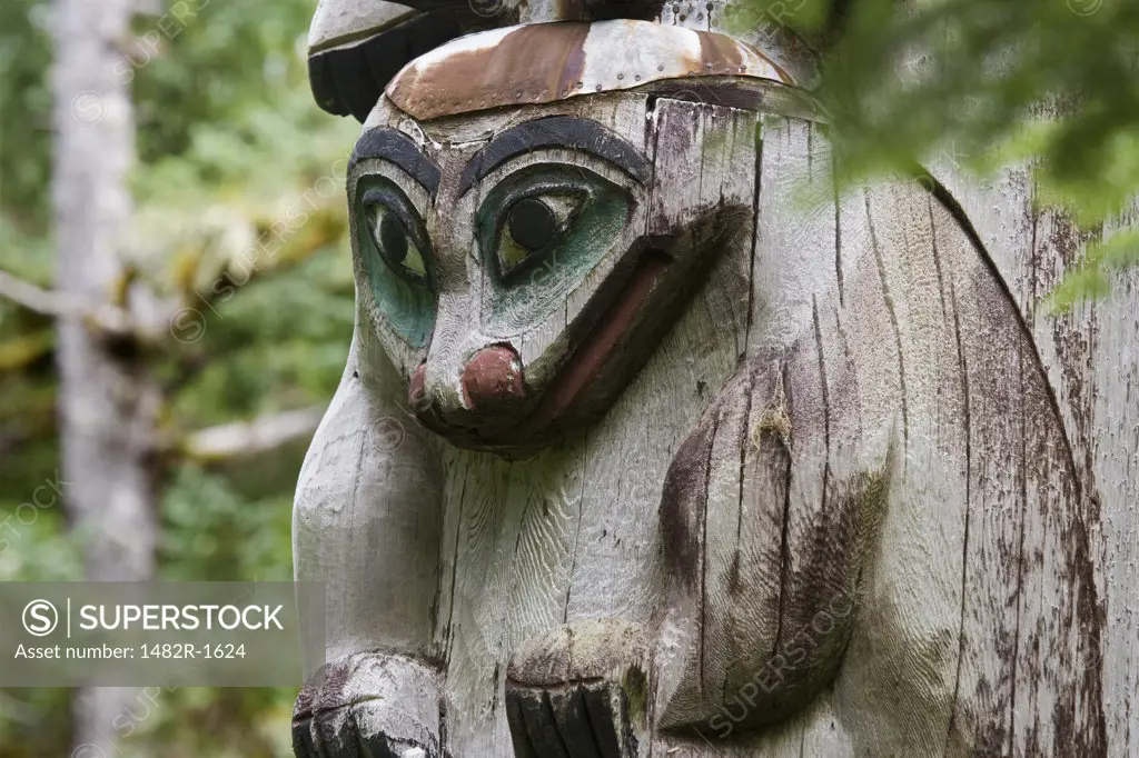 Totem pole in a forest, Kasaan Totem Park, Tongass National Forest, Alaska, USA