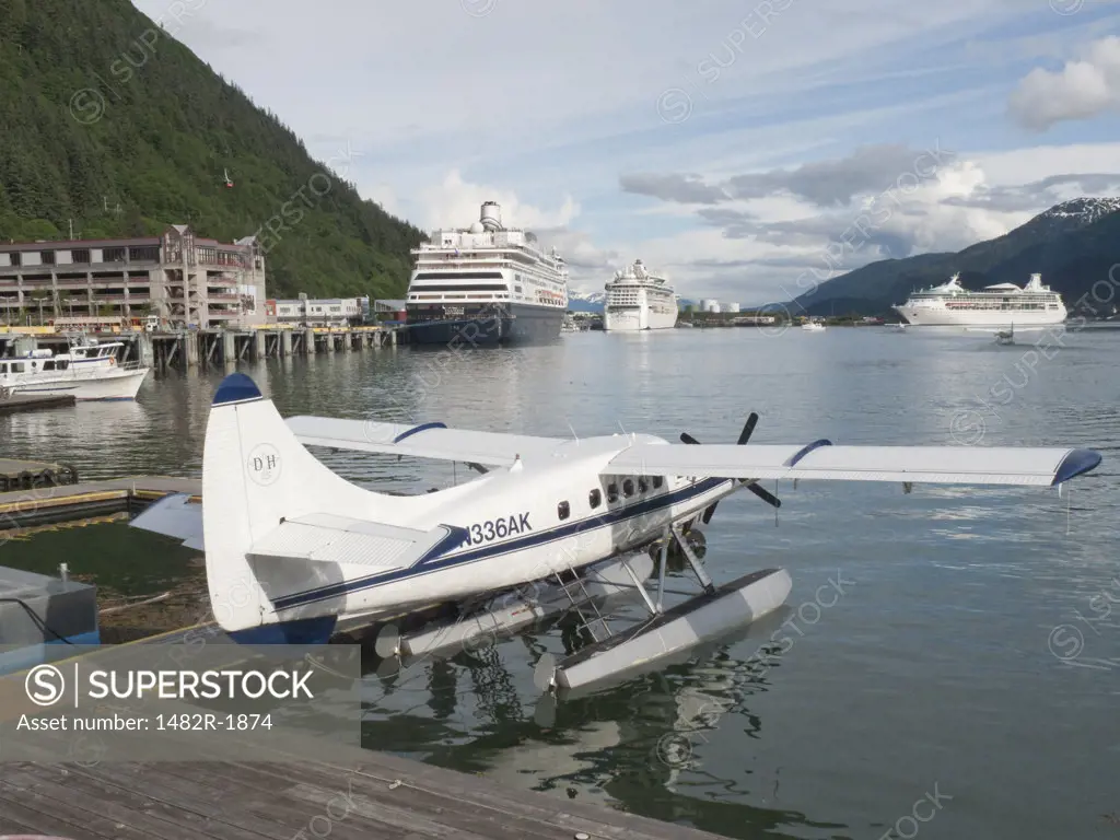 Cruise ships and a seaplane at a harbor, Juneau, Alaska, USA