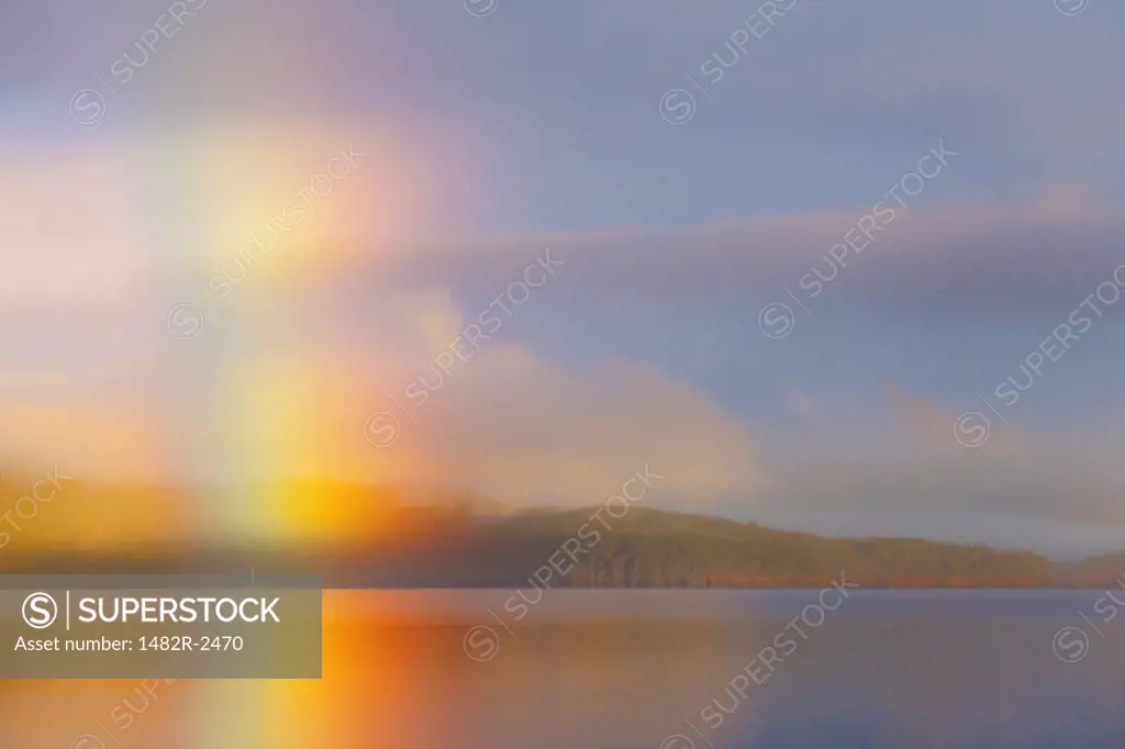 Sunrise rainbow over the sea, Hood Canal, Seabeck, Kitsap County, Washington State, USA