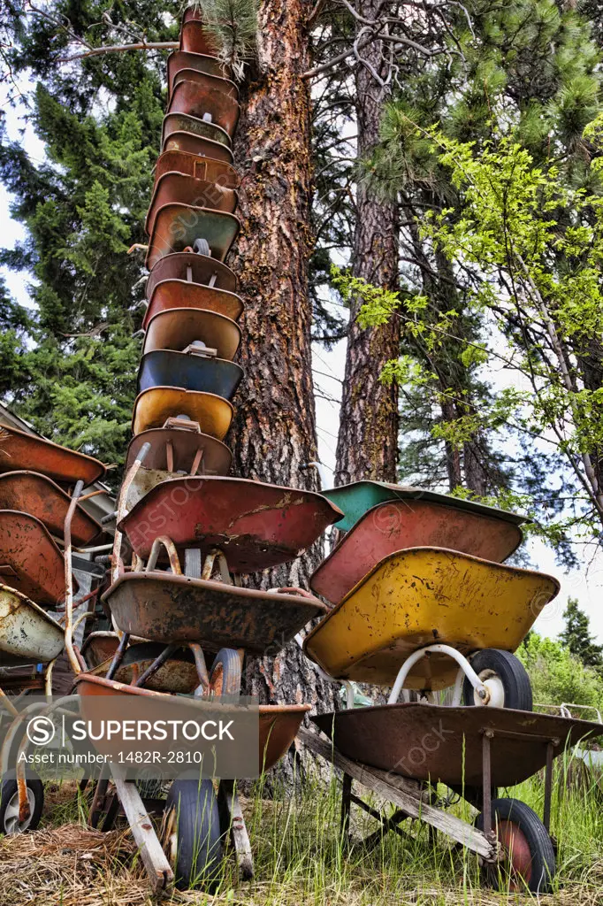 USA, Washington State, Cle Elum, Stacked Rusty Wheelbarrows