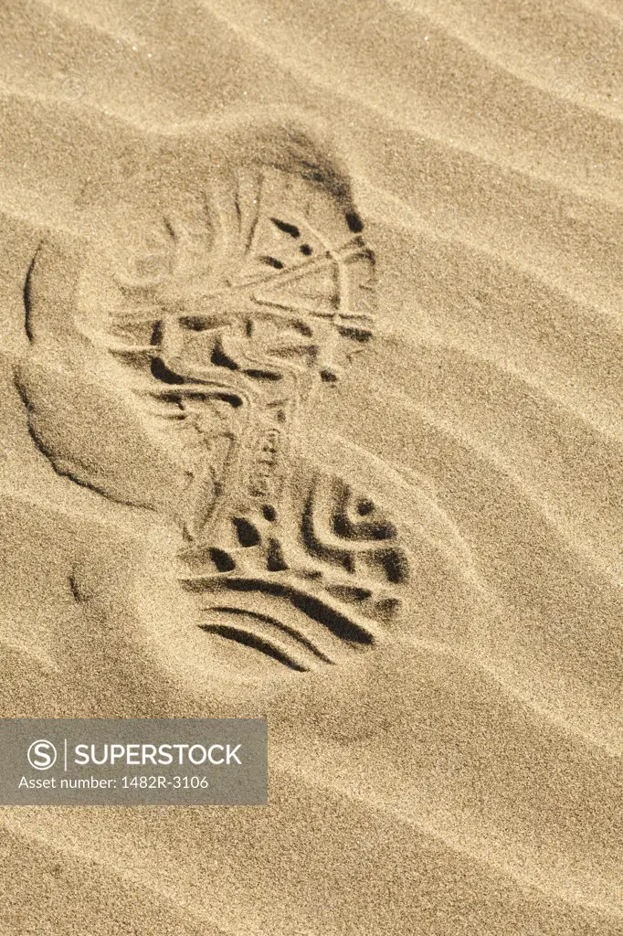 Close-up of boot print on sand, Pacific Beach, Washington State, USA