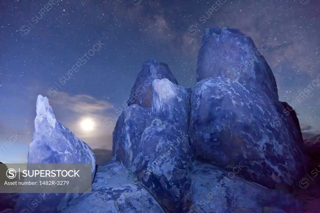 USA, California, Predawn sky with moon, Alabama Hills, near Lone Pine