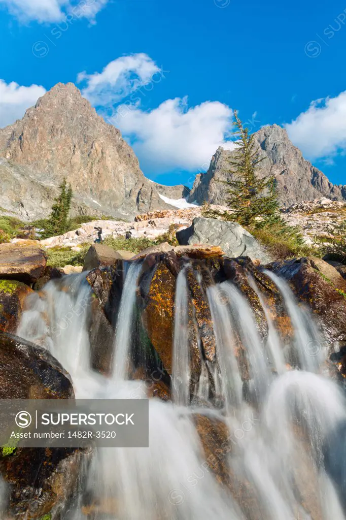 Stream falling into a lake from rocks, Mt Ritter, Banner Peak, Ansel Adams Wilderness, Inyo National Forest, California, USA