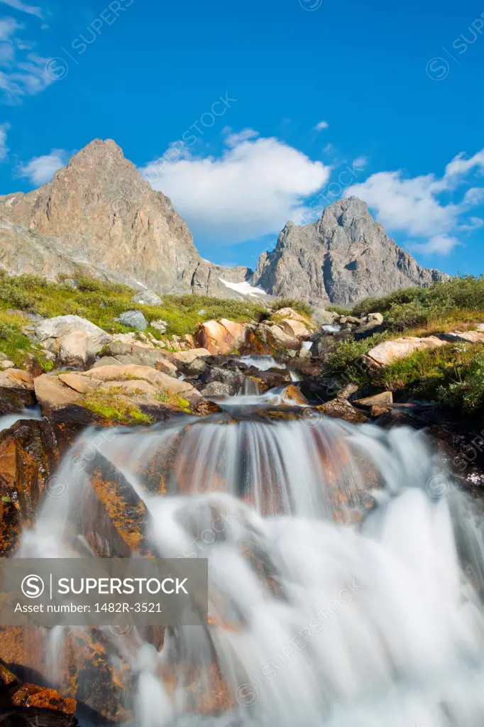 Stream falling into a lake from rocks, Mt Ritter, Banner Peak, Ansel Adams Wilderness, Inyo National Forest, California, USA