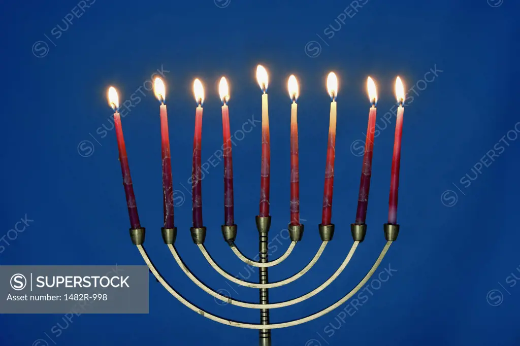 Close-up of lit candles on a menorah