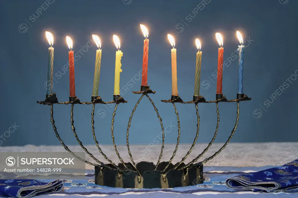 Close-up of lit candles on a menorah