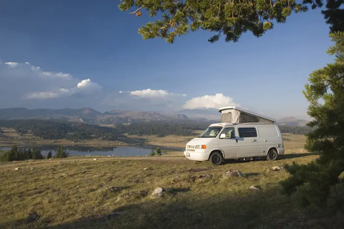 Campervan in a field, near Beartooth Pass, Wyoming, USA