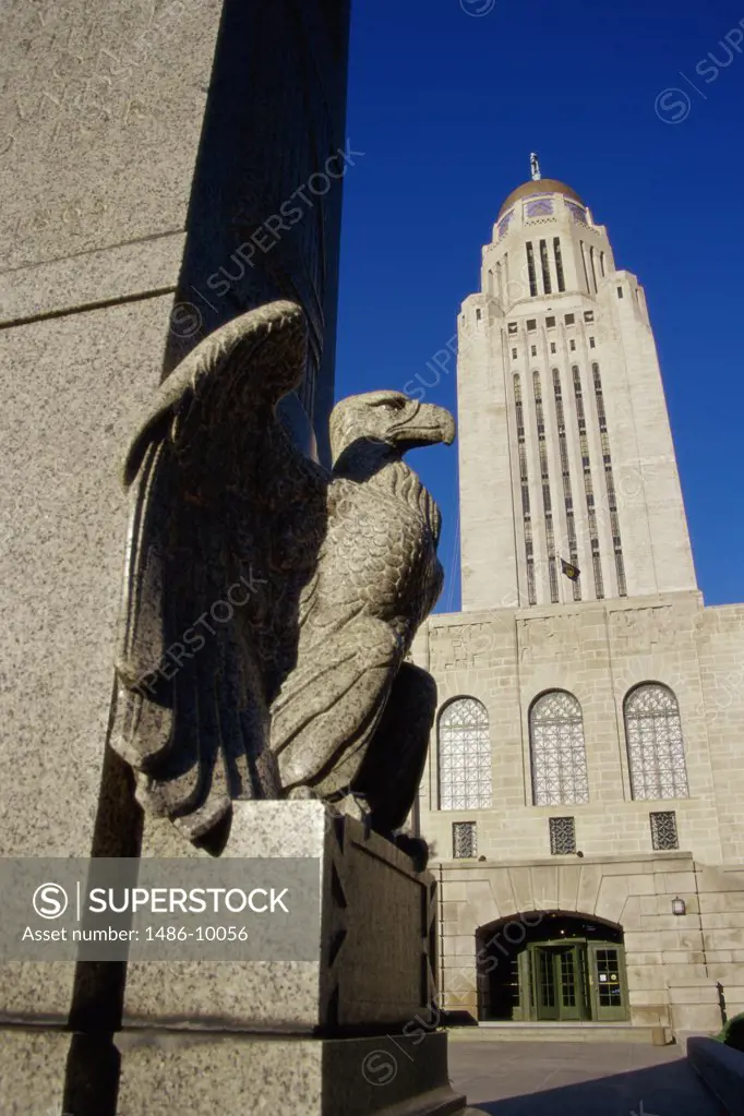 Low angle view of an eagle statue in front of a government building, State Capitol, Lincoln, Nebraska, USA