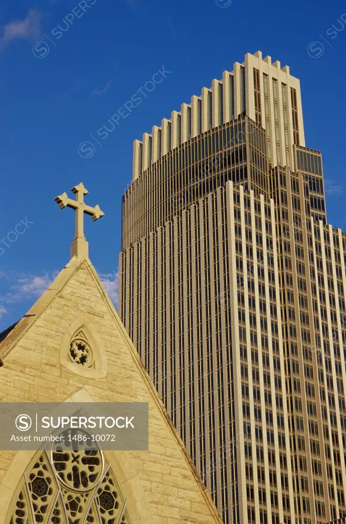 Low angle view of a cathedral and a bank, Trinity Cathedral, First National Bank, Omaha, Nebraska, USA