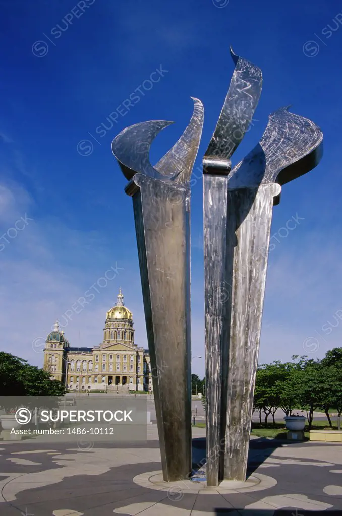 Low angle view of the Freedom Flame Monument in front of a government building, State Capitol, Des Moines, Iowa, USA