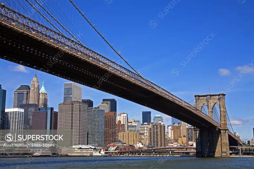 Low angle view of a bridge, Brooklyn Bridge, Lower Manhattan, Empire Fulton Ferry State Park, Dumbo District, Brooklyn, New York City, New York, USA