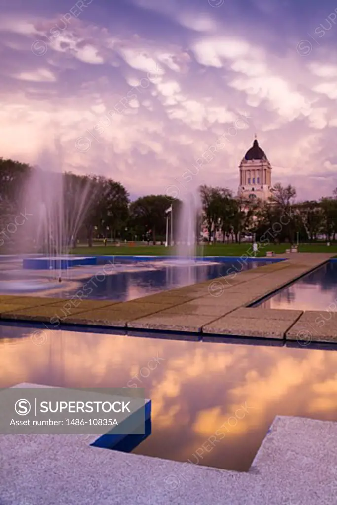 Reflection of clouds in water, Manitoba Legislative Building, Winnipeg, Manitoba, Canada