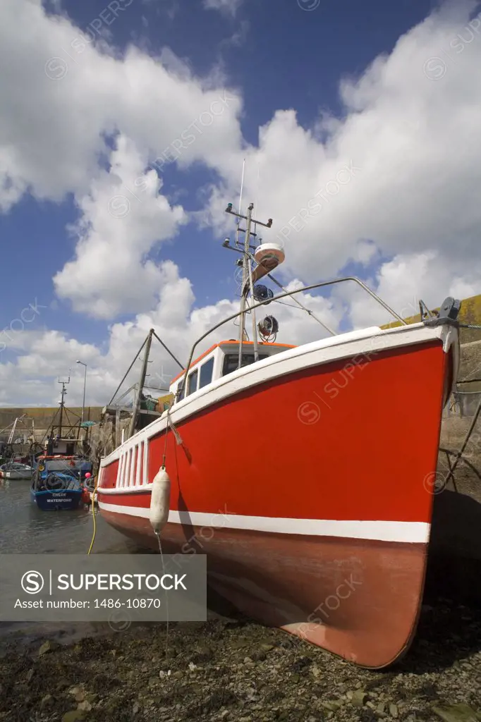 Fishing boat docked near a pier, Helvick Head, County Waterford, Munster Province, Ireland