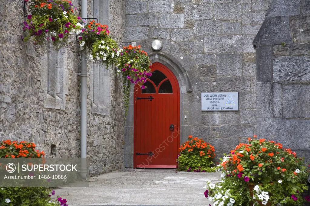 Closed door of an educational building, Our Lady's Abbey National School, Adare, County Limerick, Munster Province, Ireland