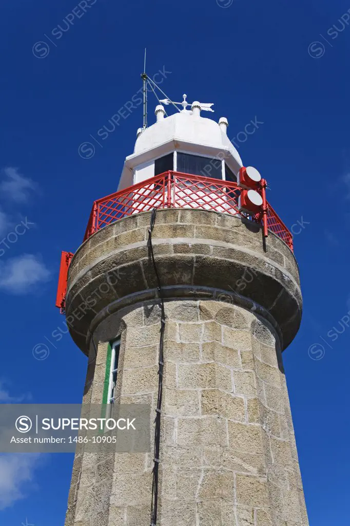 Low angle view of a lighthouse, Dunmore East Lighthouse, Dunmore East, County Waterford, Munster Province, Ireland