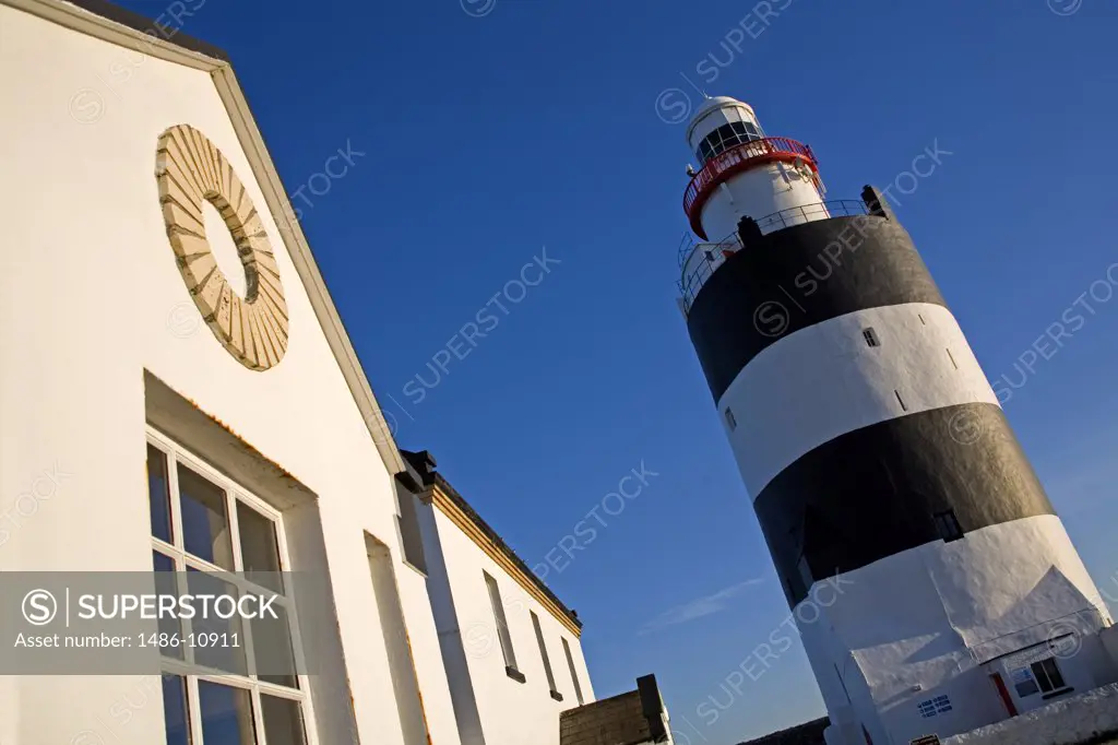 Low angle view of a lighthouse, Hook Head Lighthouse, County Wexford, Leinster Province, Ireland