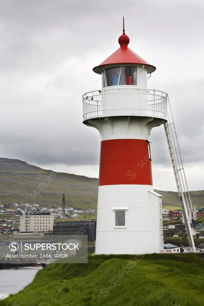 Lighthouse on an island, Skansin Fort, Torshavn, Faroe Islands, Denmark