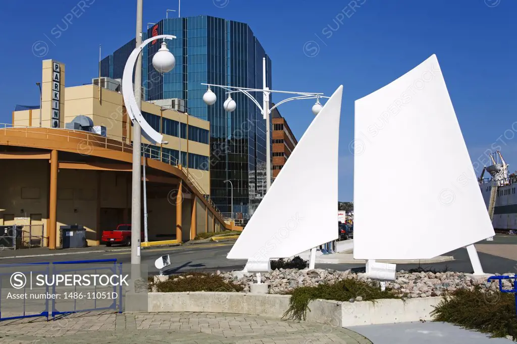 Sculptures in front of a building in a city, Scotia Building, St. John's, Newfoundland And Labrador, Canada